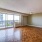 spacious living room with access to private balcony