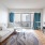 oversized window brightens furnished living room